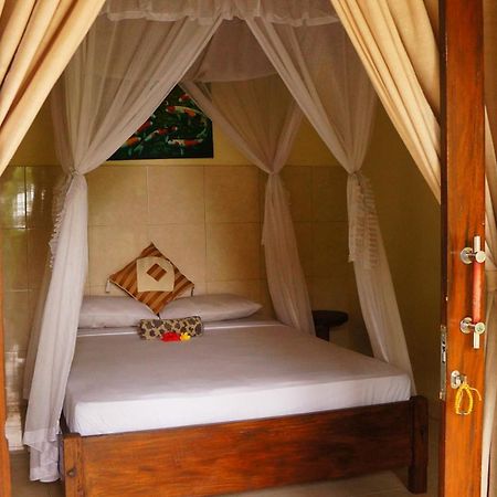 Rumahku Homestay Амед Екстер'єр фото