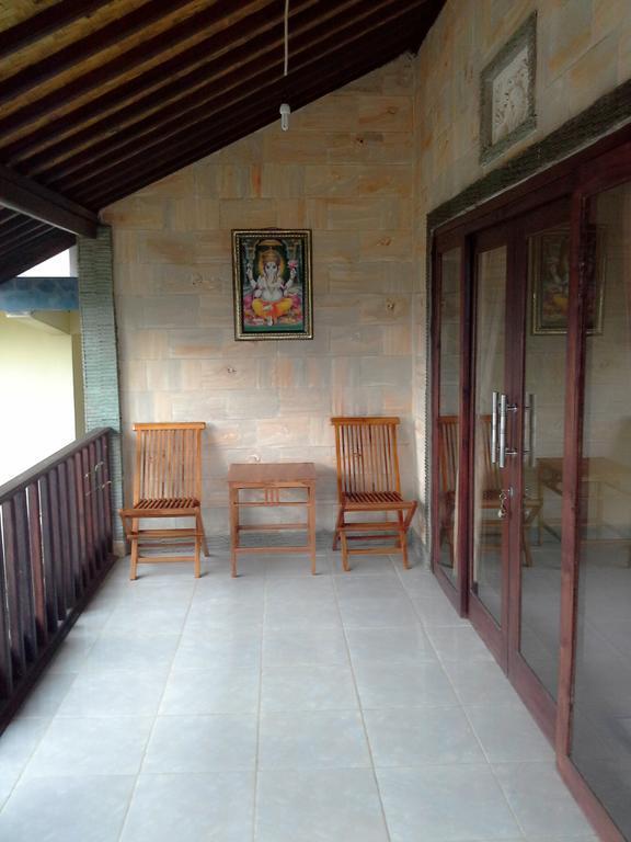 Rumahku Homestay Амед Номер фото