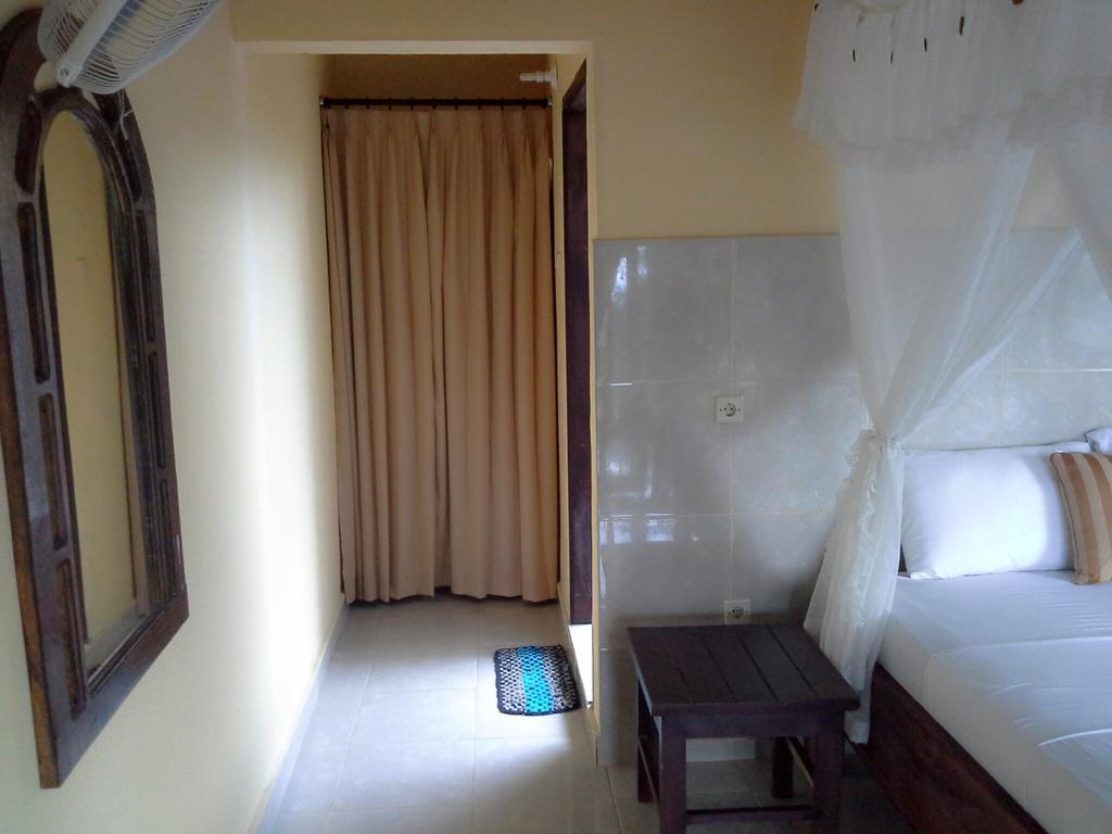 Rumahku Homestay Амед Номер фото