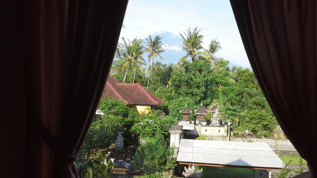 Rumahku Homestay Амед Номер фото
