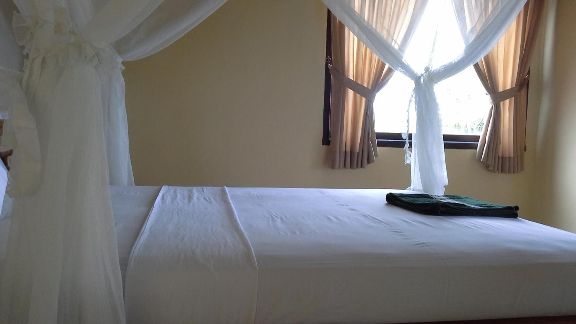 Rumahku Homestay Амед Номер фото
