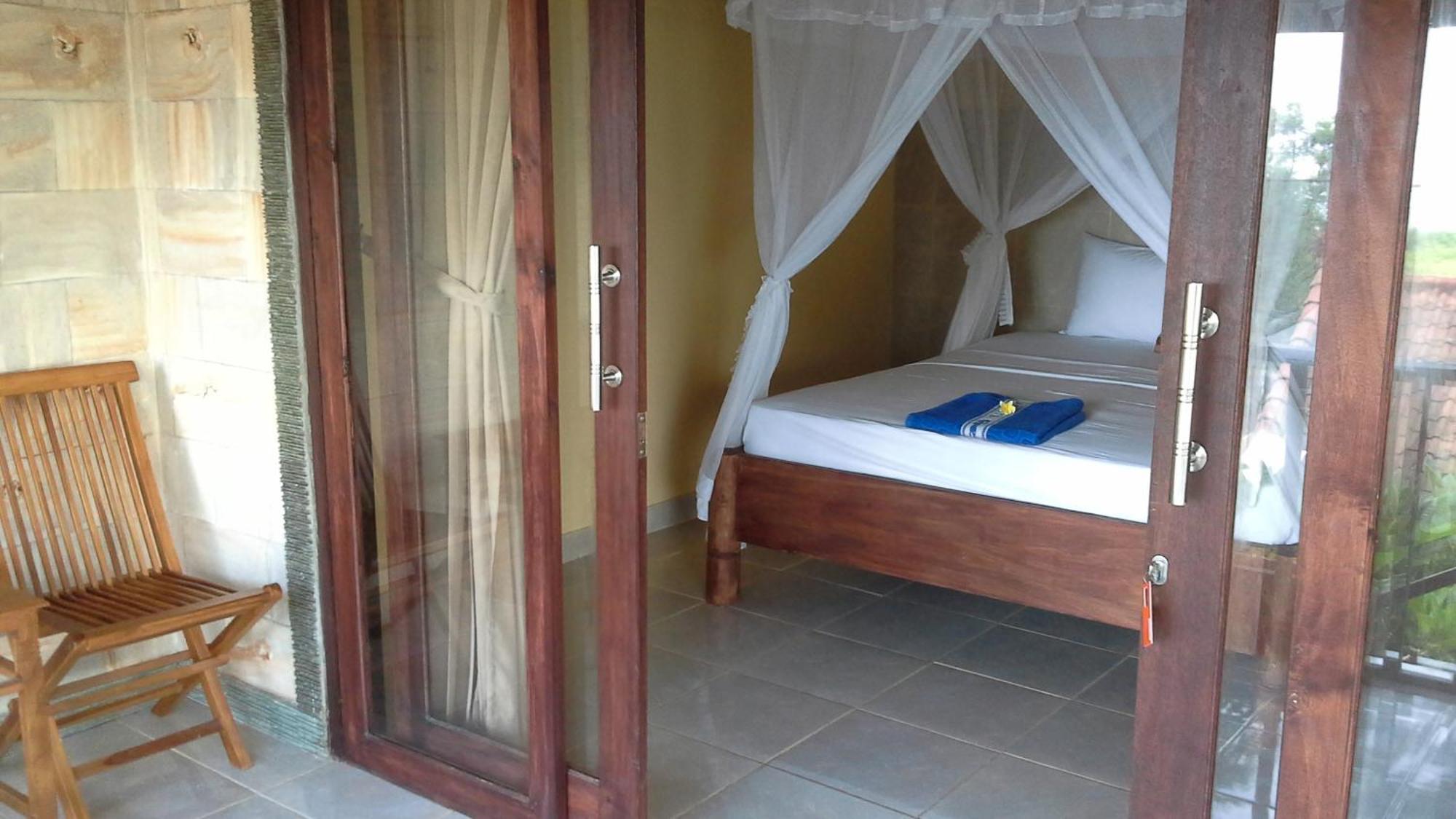 Rumahku Homestay Амед Номер фото