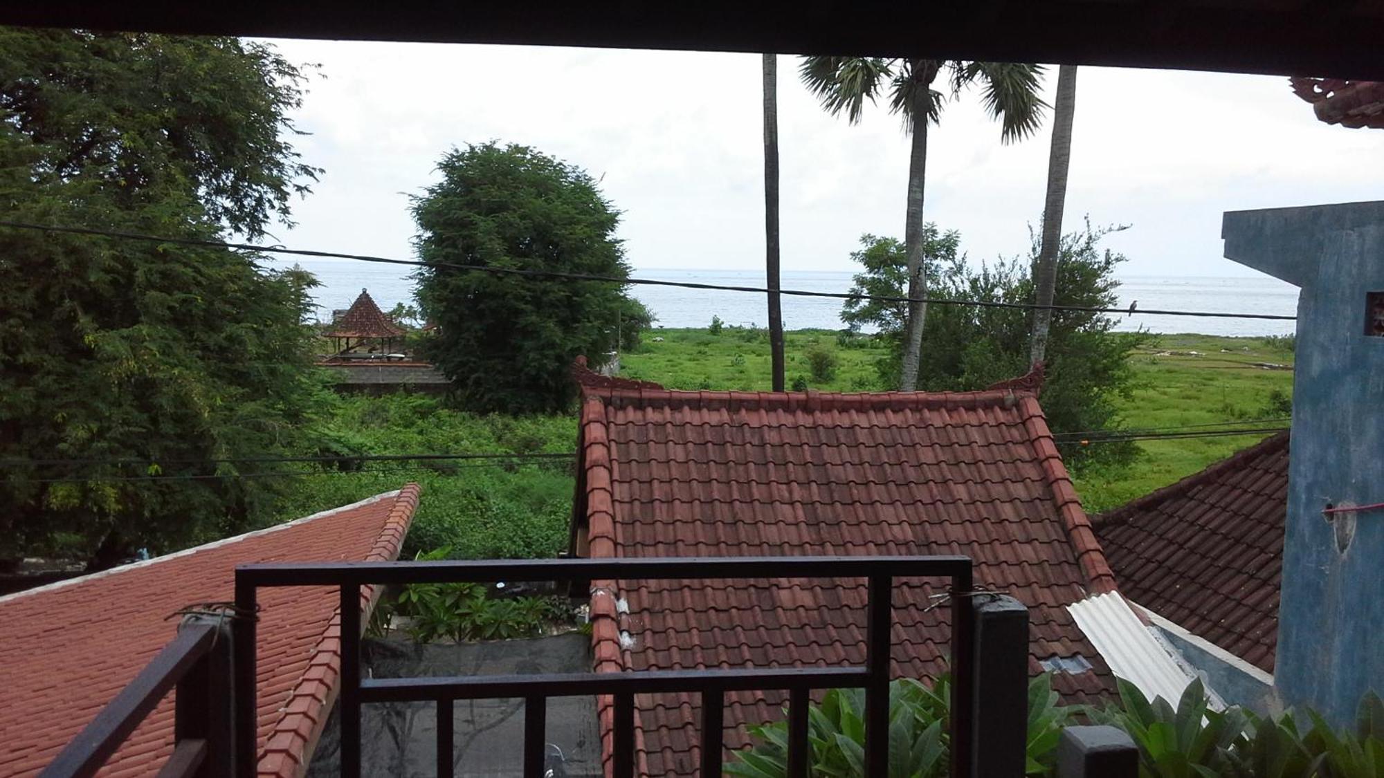 Rumahku Homestay Амед Номер фото